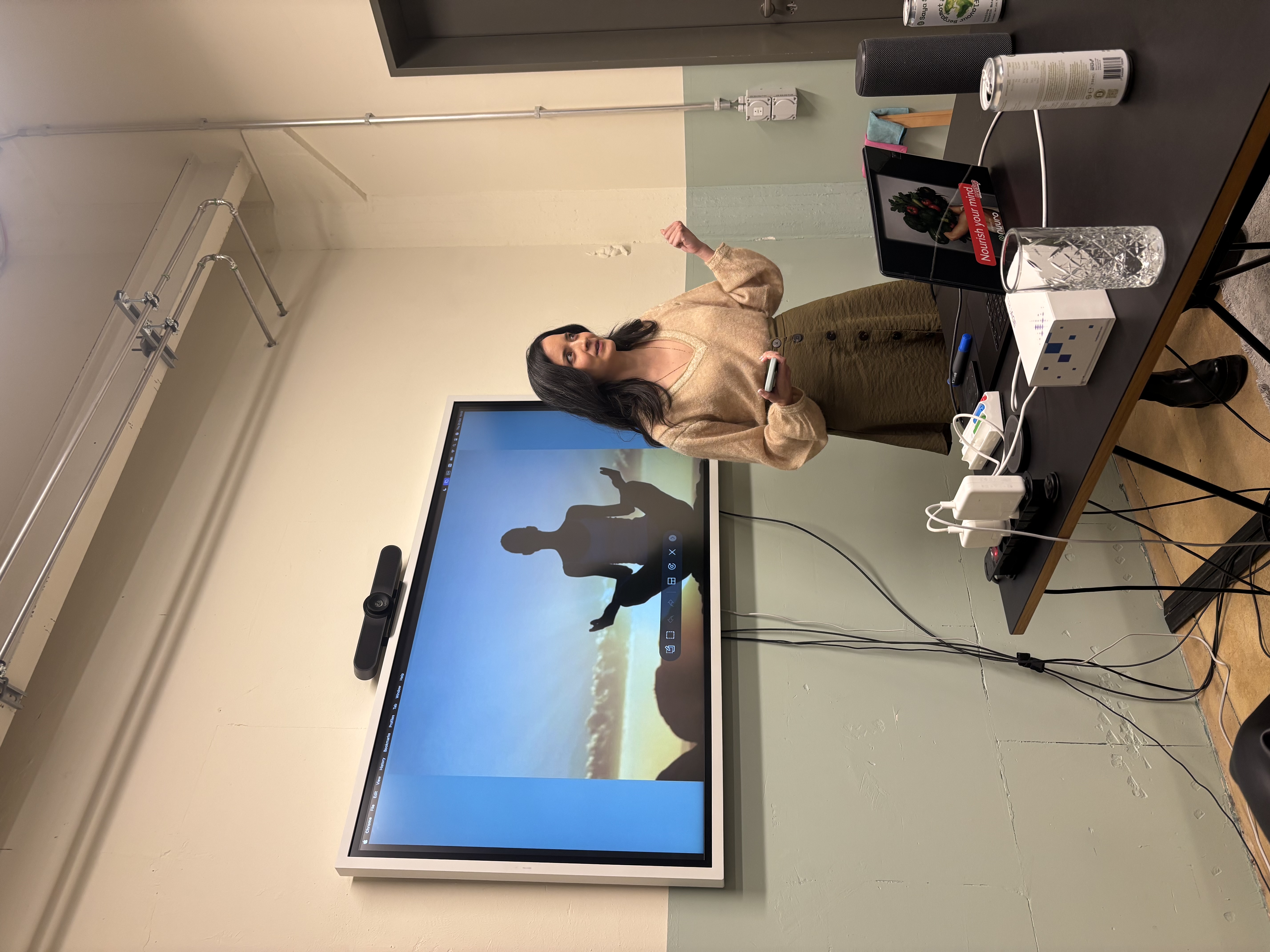 Christie Dixon presenting on somatic practices and psilocybin research at Nourish Your Mind